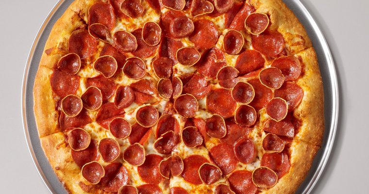 A huge pepperoni pizza